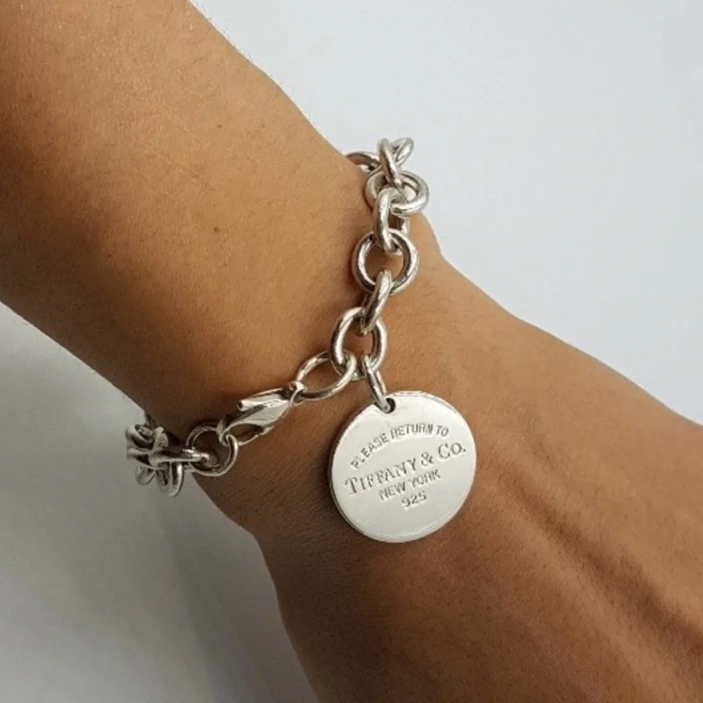 Authenticated Tiffany & Co. Return to Tiffany Round Charm Bracelet Silver 7.5”